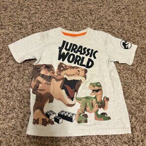 Jurassic World X Lego Graphic T Shirt XS Xtra Small 4-5 Beige Short Sleeve T Rex